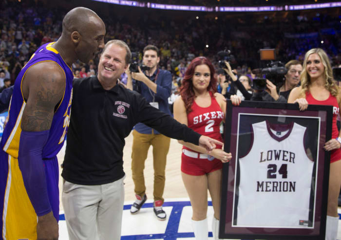 Downer kept in touch with Bryant, including presenting him with a jersey at a 2015 Sixers game.